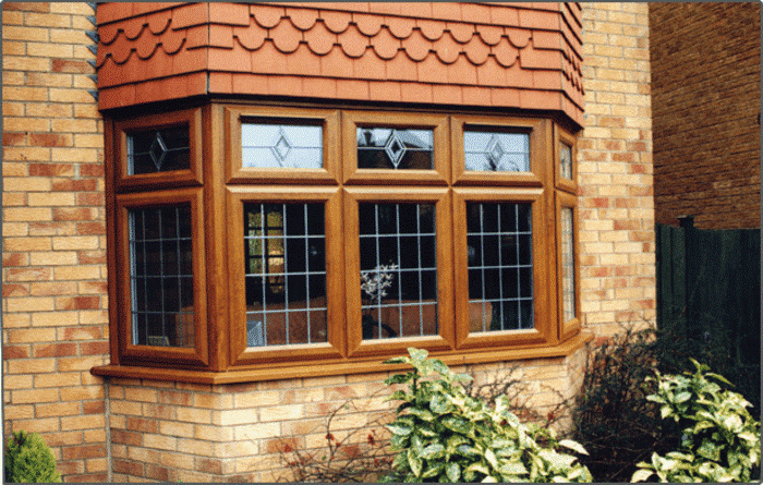 Mẫu cửa nhựa lõi thép vân gỗ tại các cửa sổ
