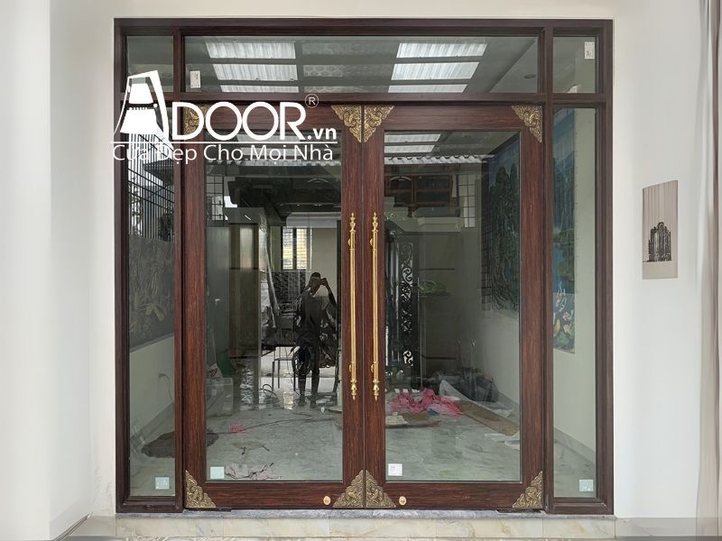 Mẫu Cửa nhôm thủy lực màu vân gỗ trắc