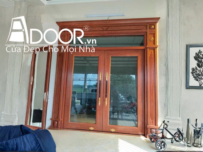 Mẫu Cửa nhôm thủy lực màu vân gỗ hoàng đàn