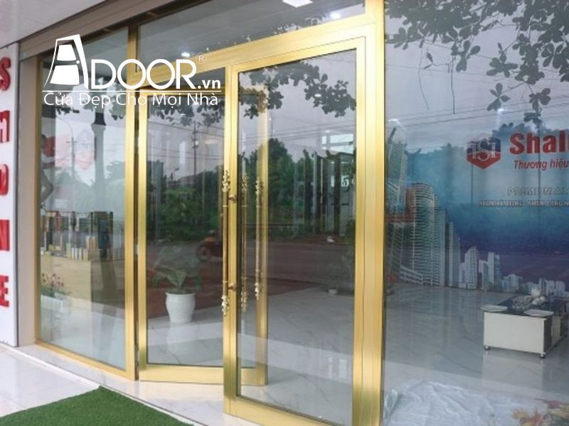 Mẫu Cửa nhôm thủy lực màu vàng
